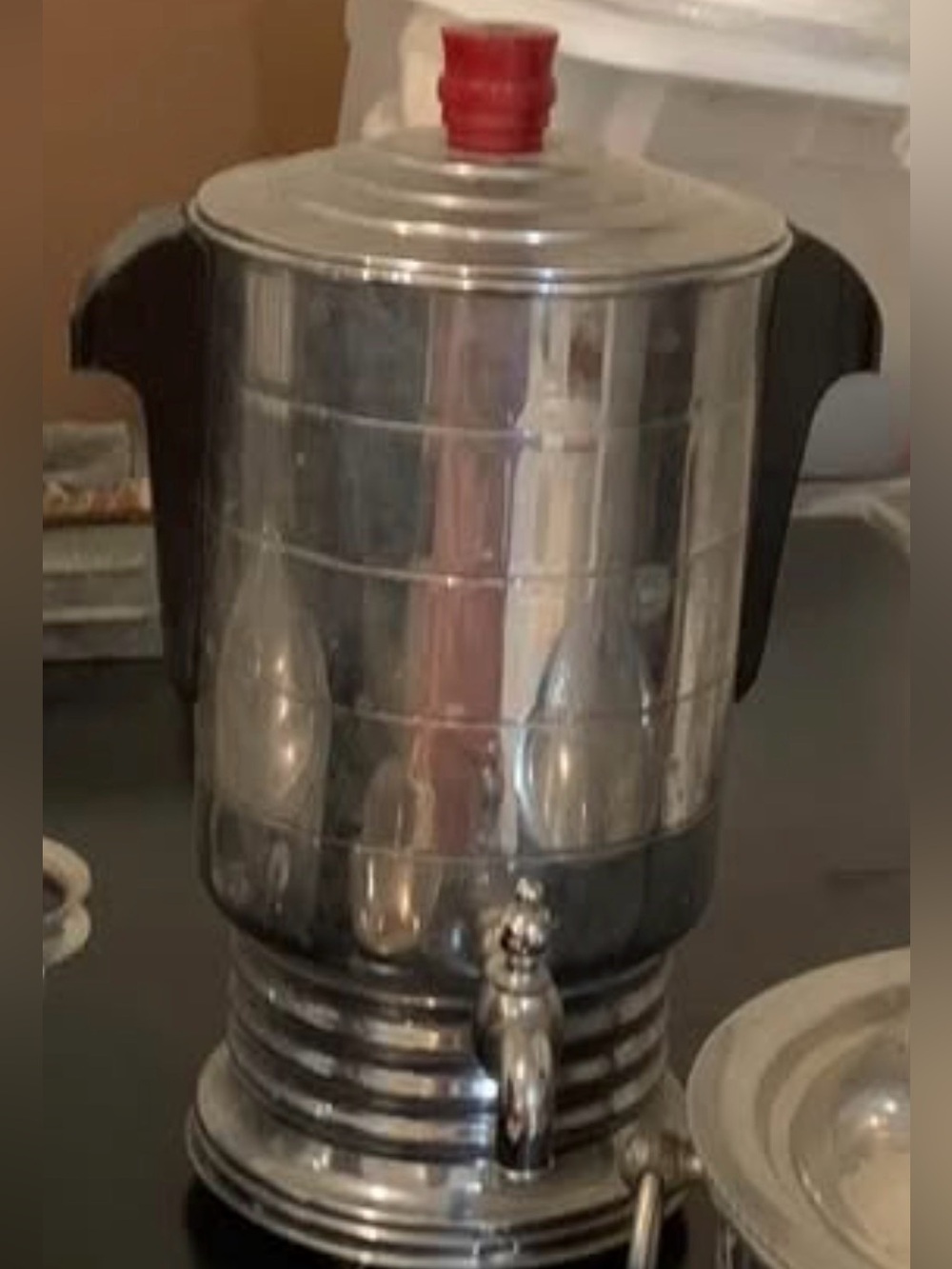 Stainless Steel Beverage Dispenser with Red Knob and Black Handles